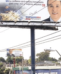 Anuncios publicitarios del candidato de ARENA Rodrigo Ávila y del candidato del FMLN, Mauricio Funes