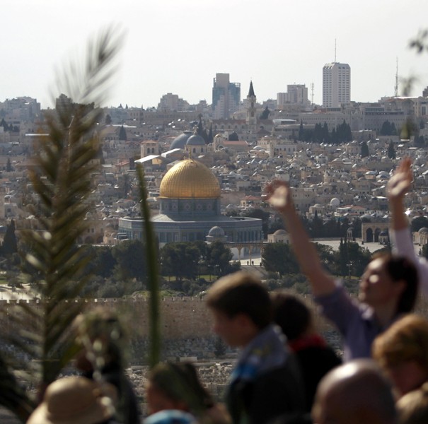 Catholic Christians take part in a Palm Sunday procession in Jerusalem